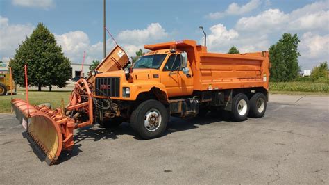 A plow truckspreader truck is a truck with a plow in front andor a salt or sand spreader in the back, most often used for clearing snow from roads, but some plows are designed for plowing through different terrains such as sand, dirt, and rocks. . Plow trucks for sale